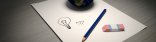 Ein Blatt Papier mit Stift und Radiergummi
